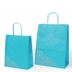 Le sac kraft shopping Turquoise avec le cliché de personnalisation « Flocons » en argent.